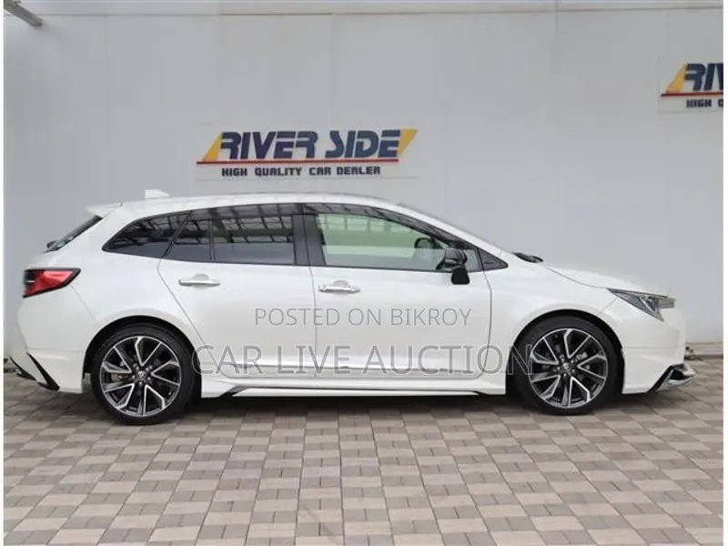 Toyota Corolla Hybrid WXB TOURING 2021
