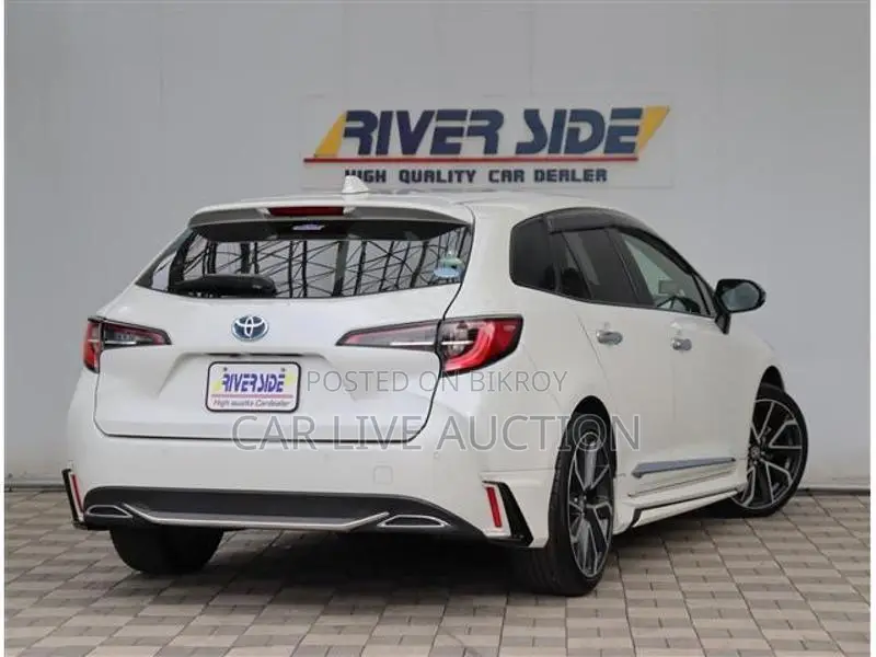 Toyota Corolla Hybrid WXB TOURING 2021