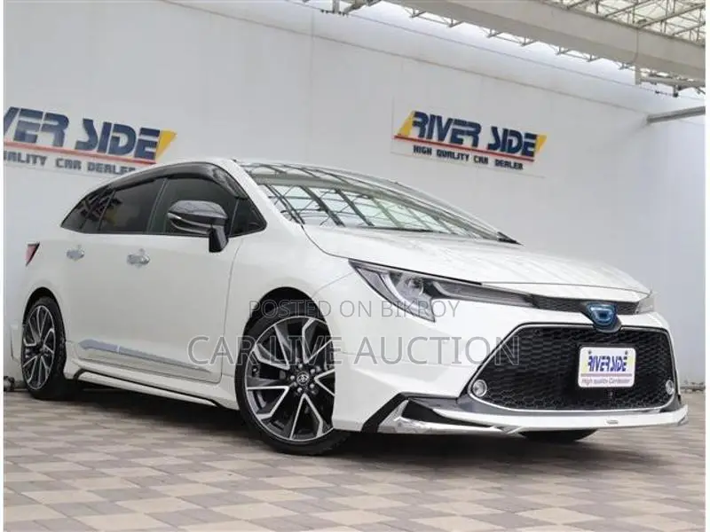 Toyota Corolla Hybrid WXB TOURING 2021