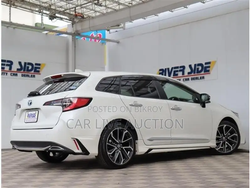 Toyota Corolla Hybrid WXB TOURING 2021