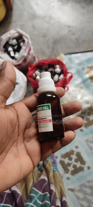 হোমিওপ্যাথি ঔষধের শিশি