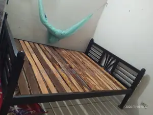 Wooden Bed with Mattress and Quilt