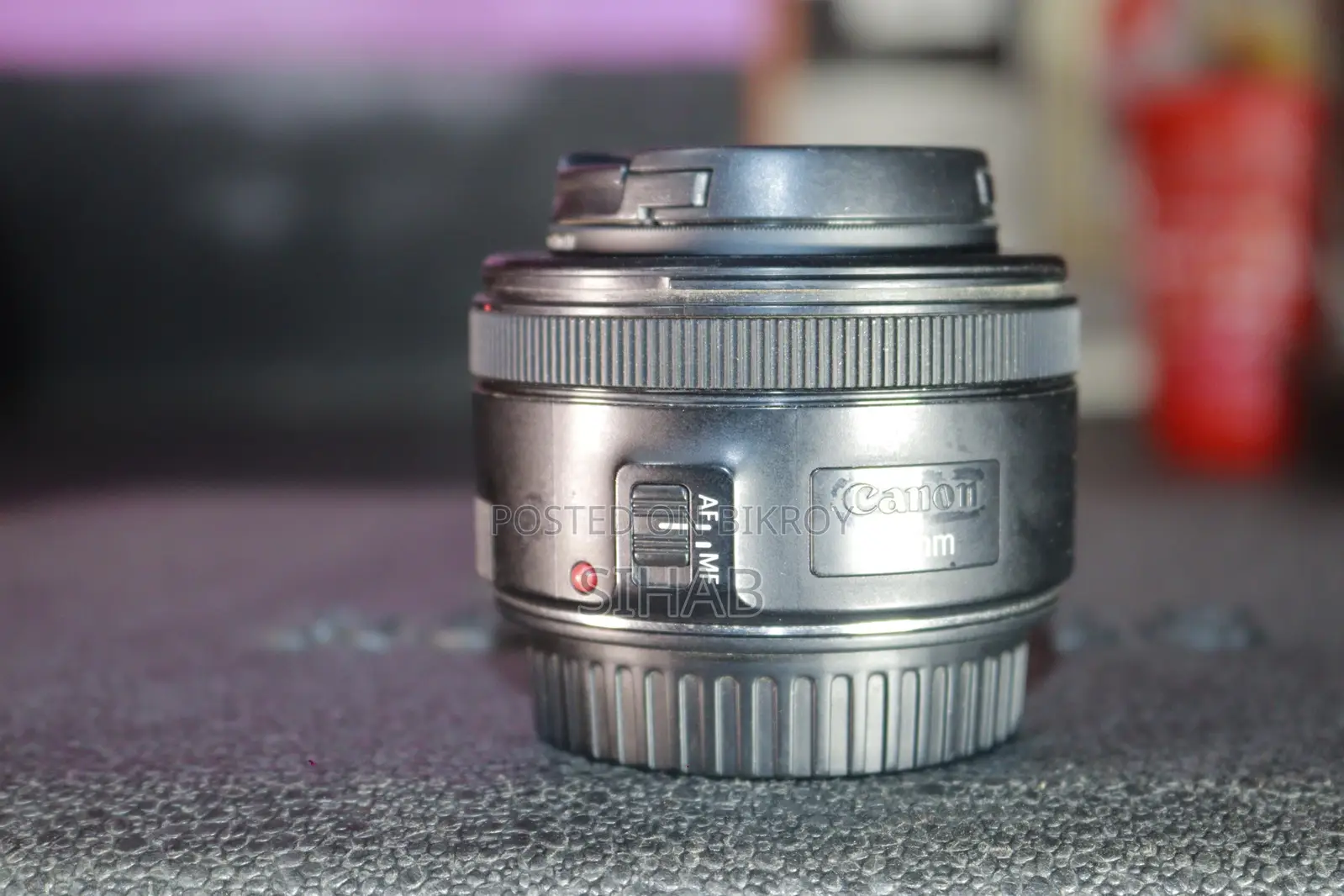 Canon 50 mm + 18-135 Stm