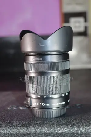 Canon 50 mm + 18-135 Stm