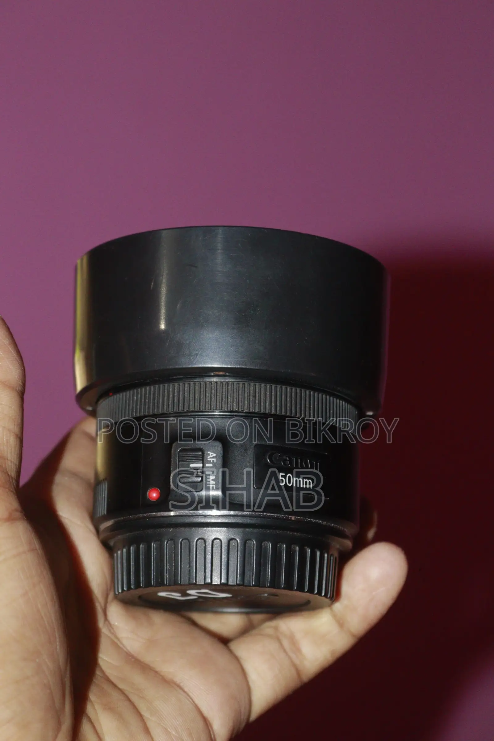 Canon 50 mm + 18-135 Stm