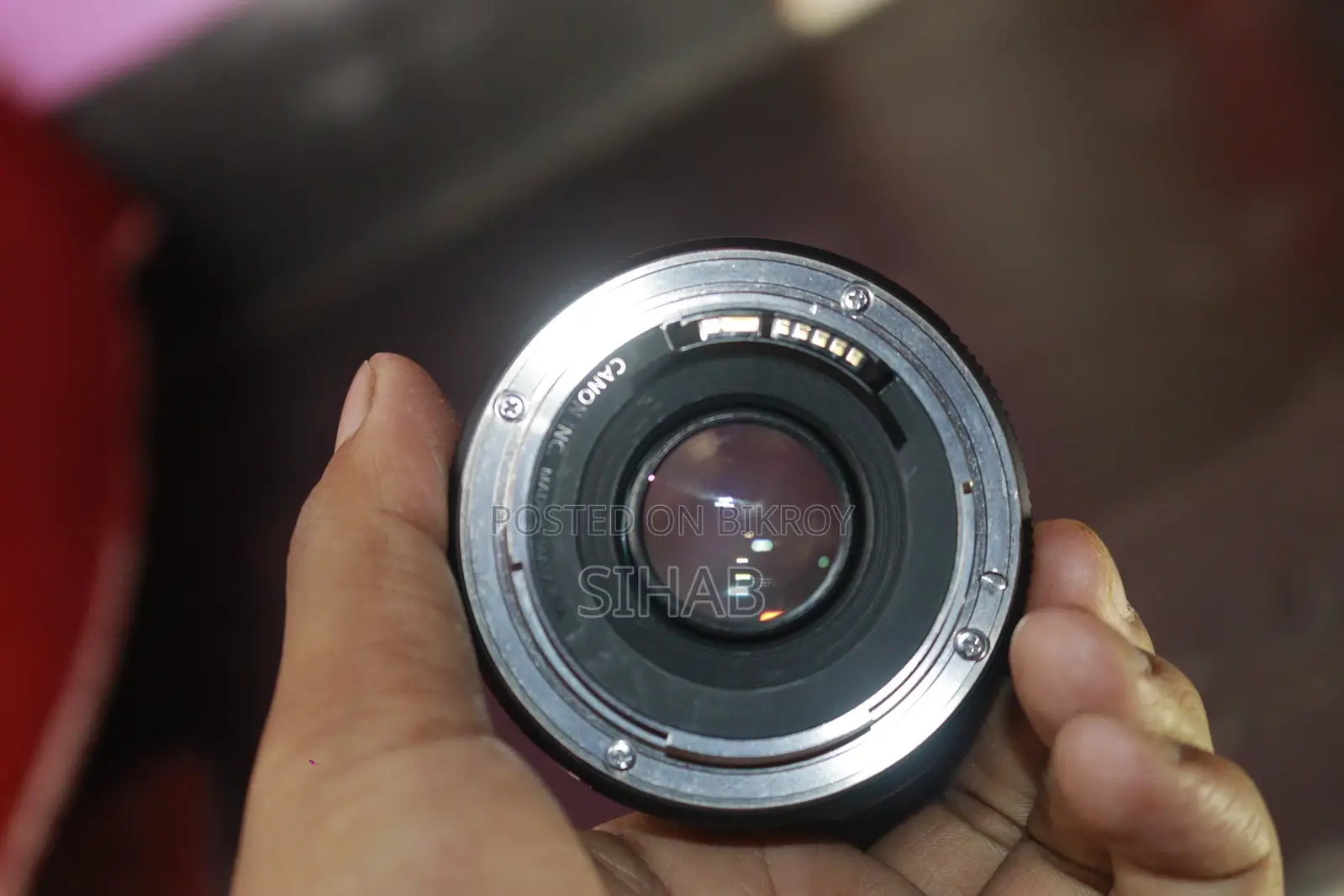 Canon 50 mm + 18-135 Stm