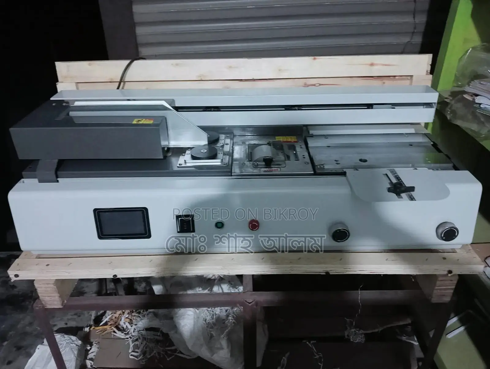 Automatic Glue Binding Machine for Notebook Production.