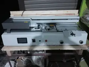 Automatic Glue Binding Machine for Notebook Production.