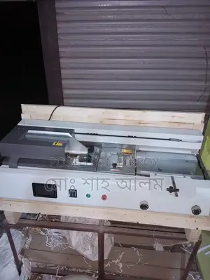 Automatic Glue Binding Machine for Notebook Production.