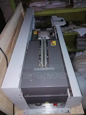 Automatic Glue Binding Machine for Notebook Production.