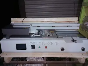 Automatic Glue Binding Machine for Notebook Production.