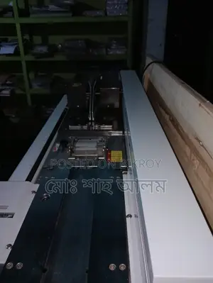 Automatic Glue Binding Machine for Notebook Production.