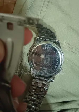 Titan 1555sec ঘড়ি – প্রিমিয়াম স্টিল | এনালগ + তারিখ