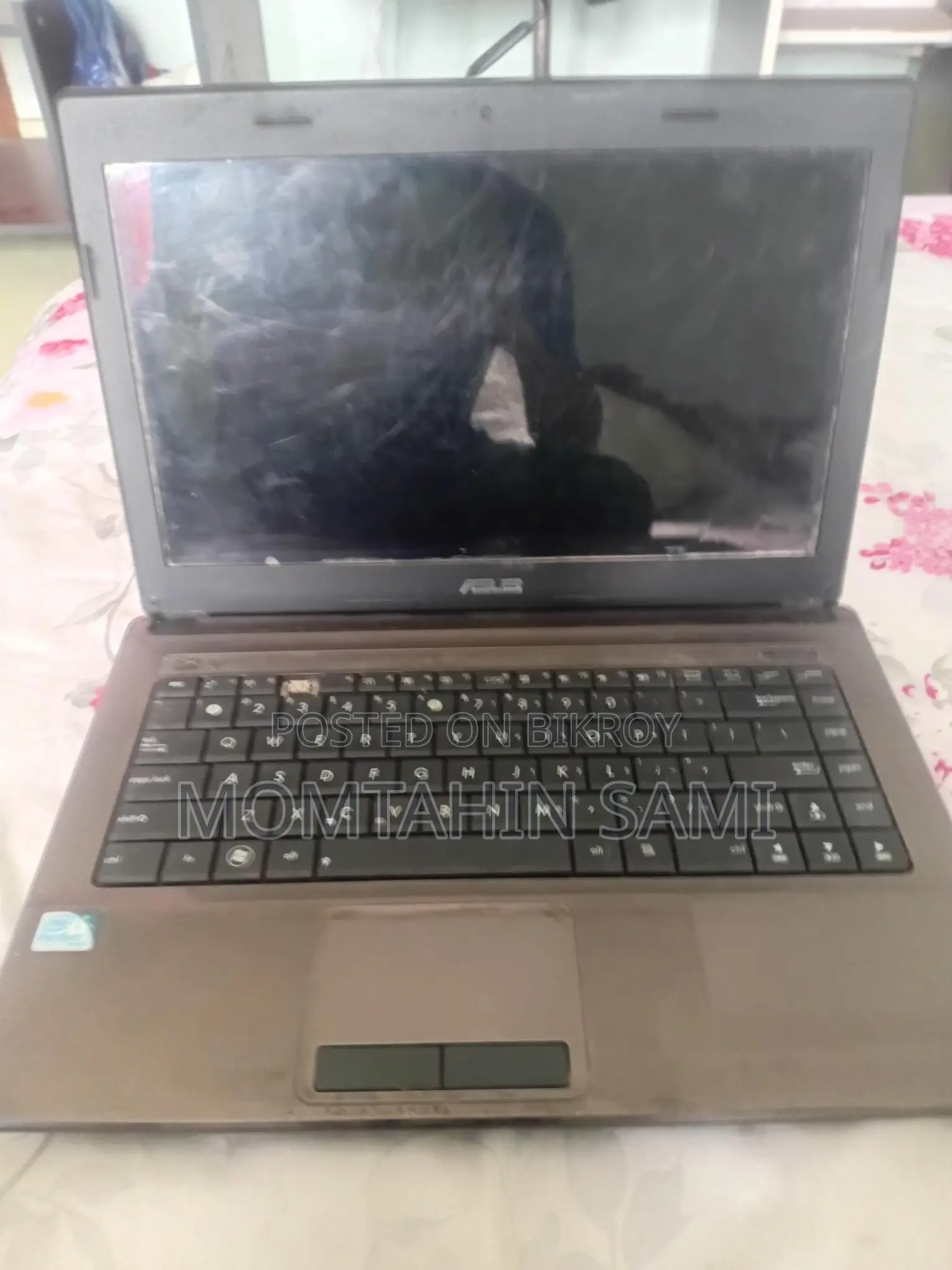 ASUS Laptop with Broken Display and Charging Issue
