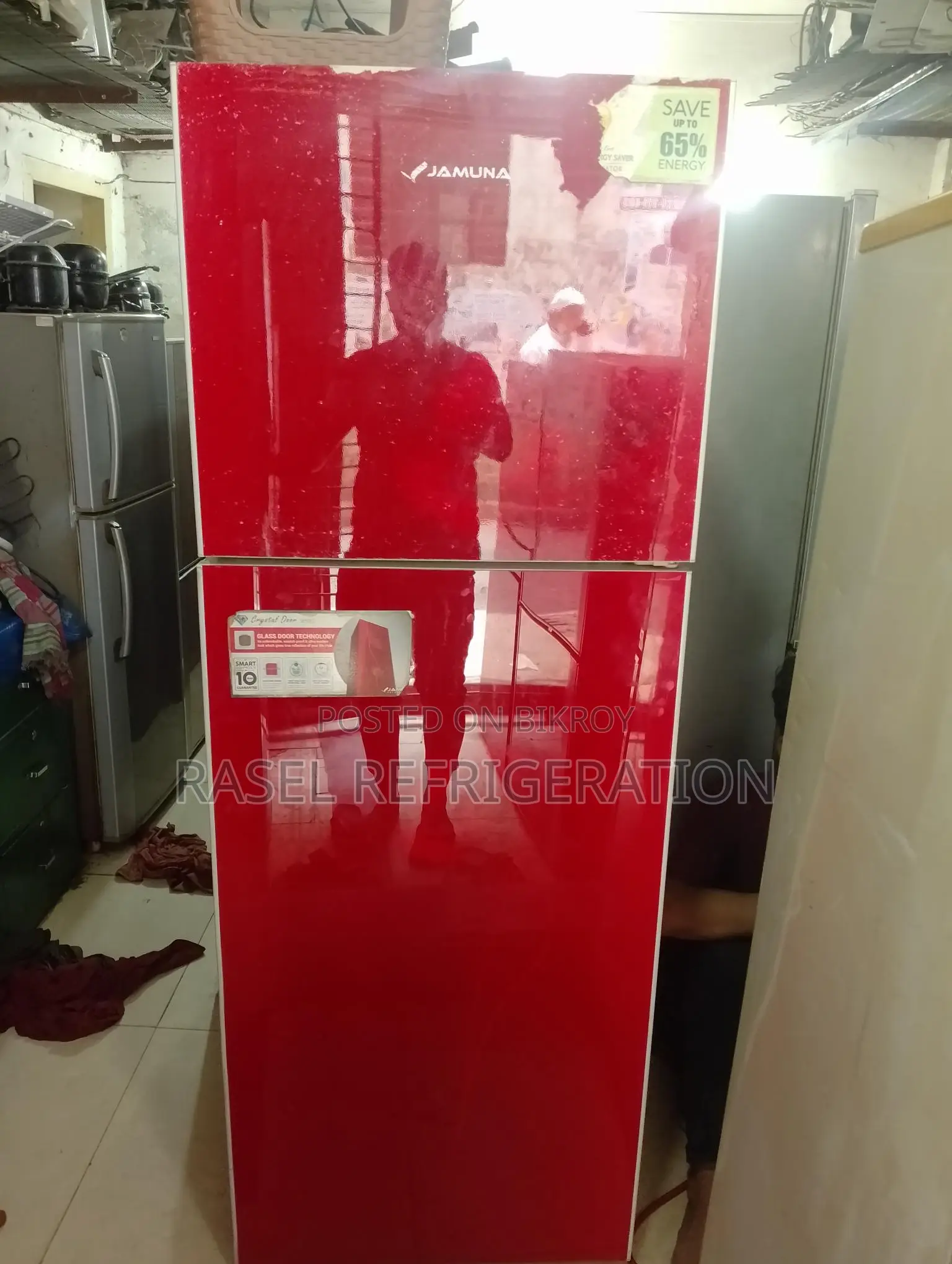 18 cubic feet red glass door refrigerator for sale, running and all original.