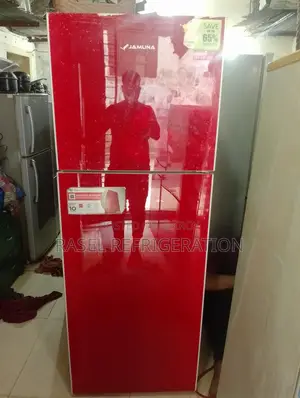 18 cubic feet red glass door refrigerator for sale, running and all original.