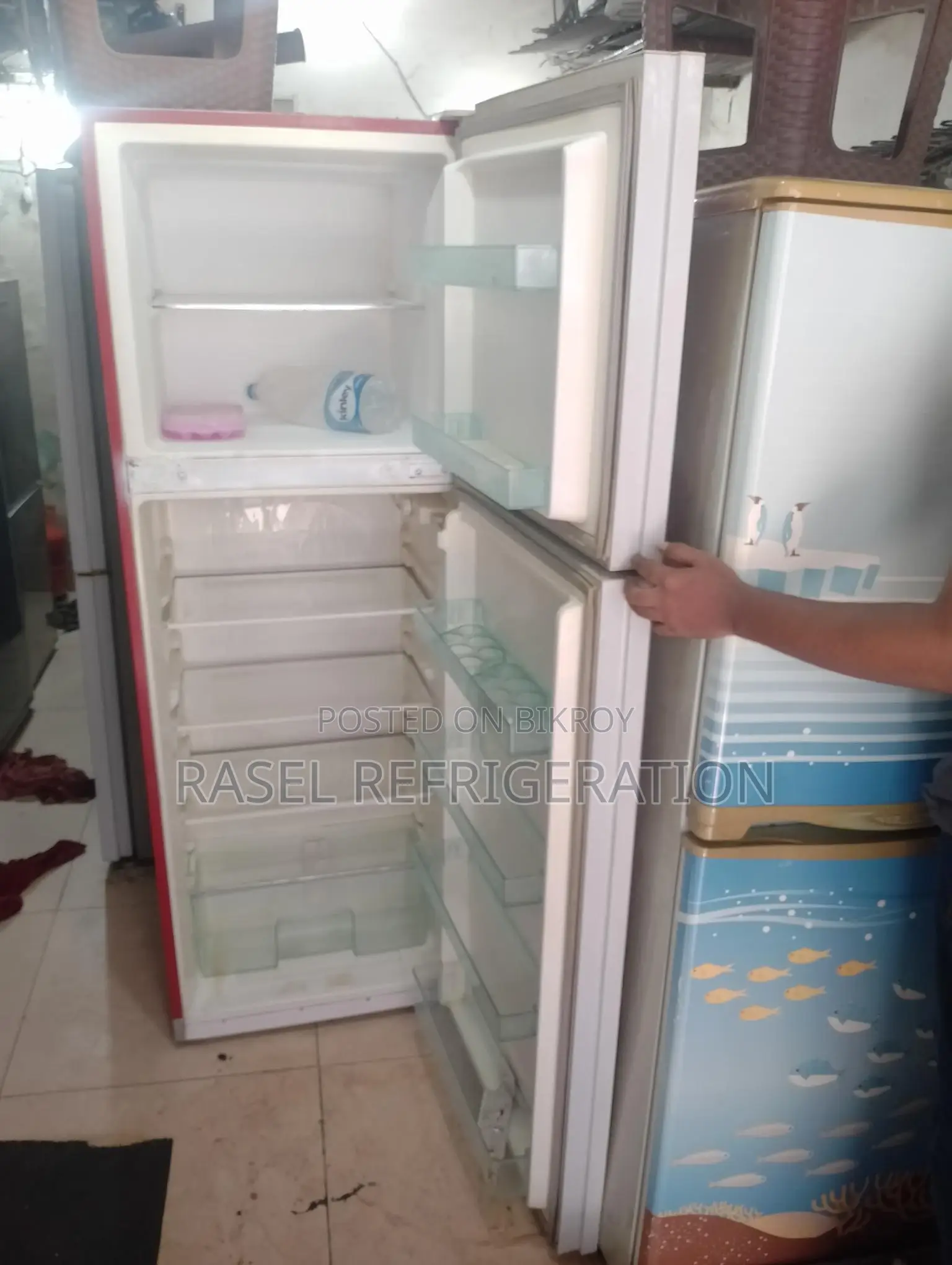 18 cubic feet red glass door refrigerator for sale, running and all original.