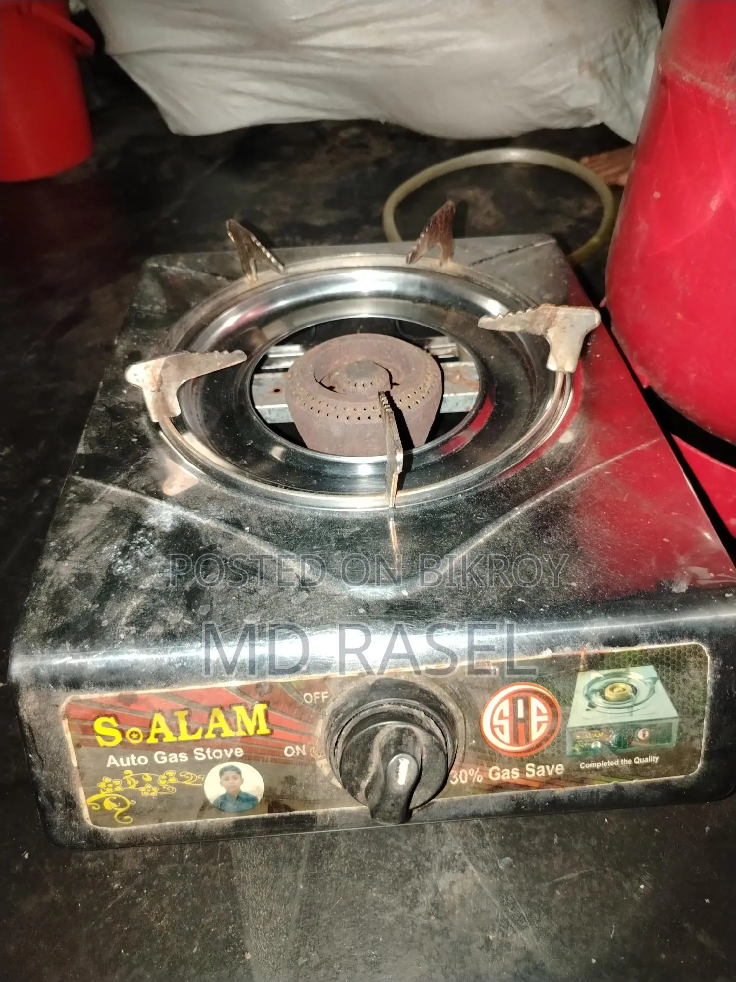 Gas Stove and Empty Cylinder