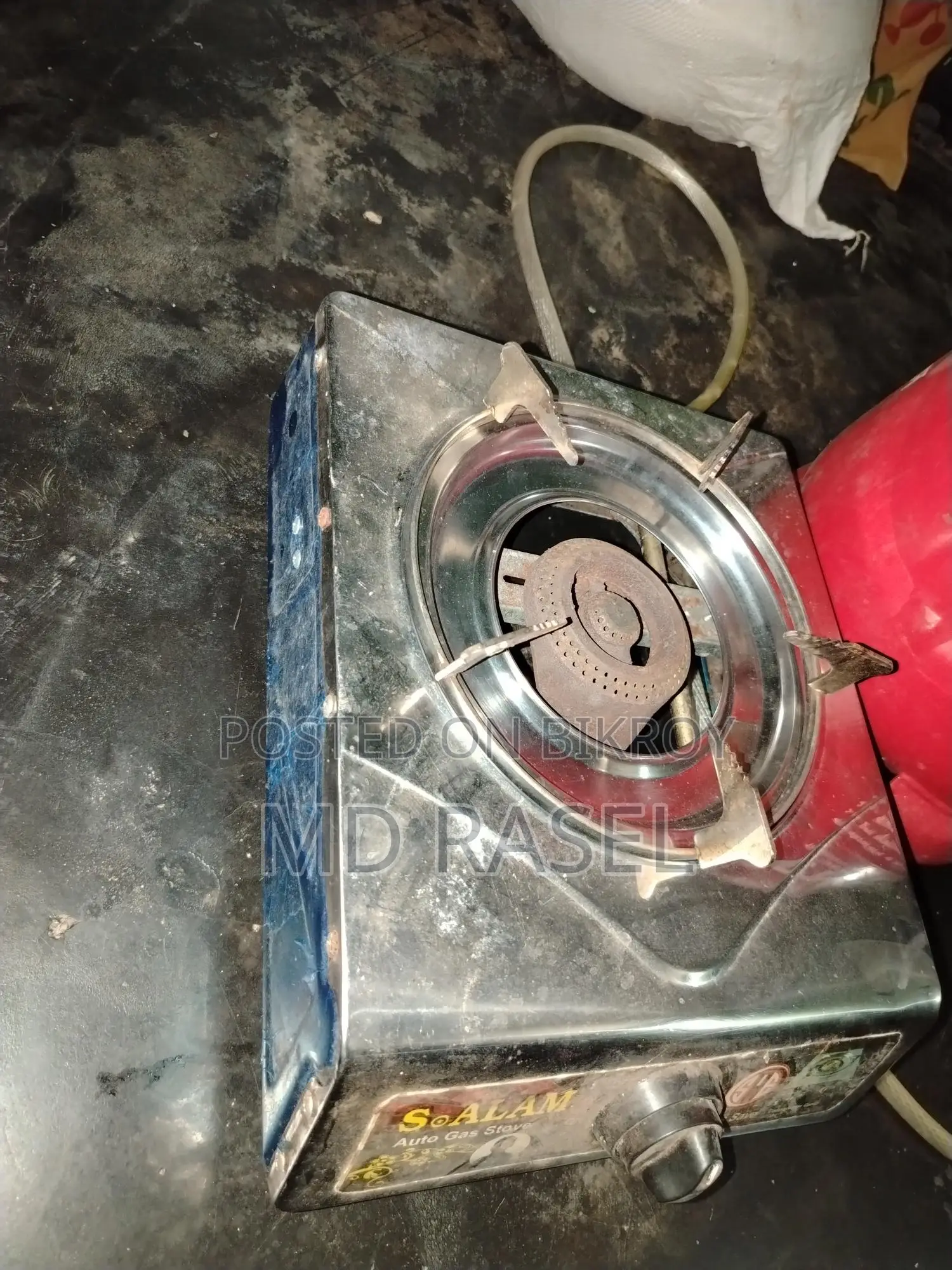 Gas Stove and Empty Cylinder