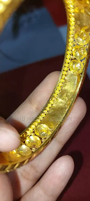 21 Karat Gold