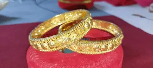 21 Karat Gold