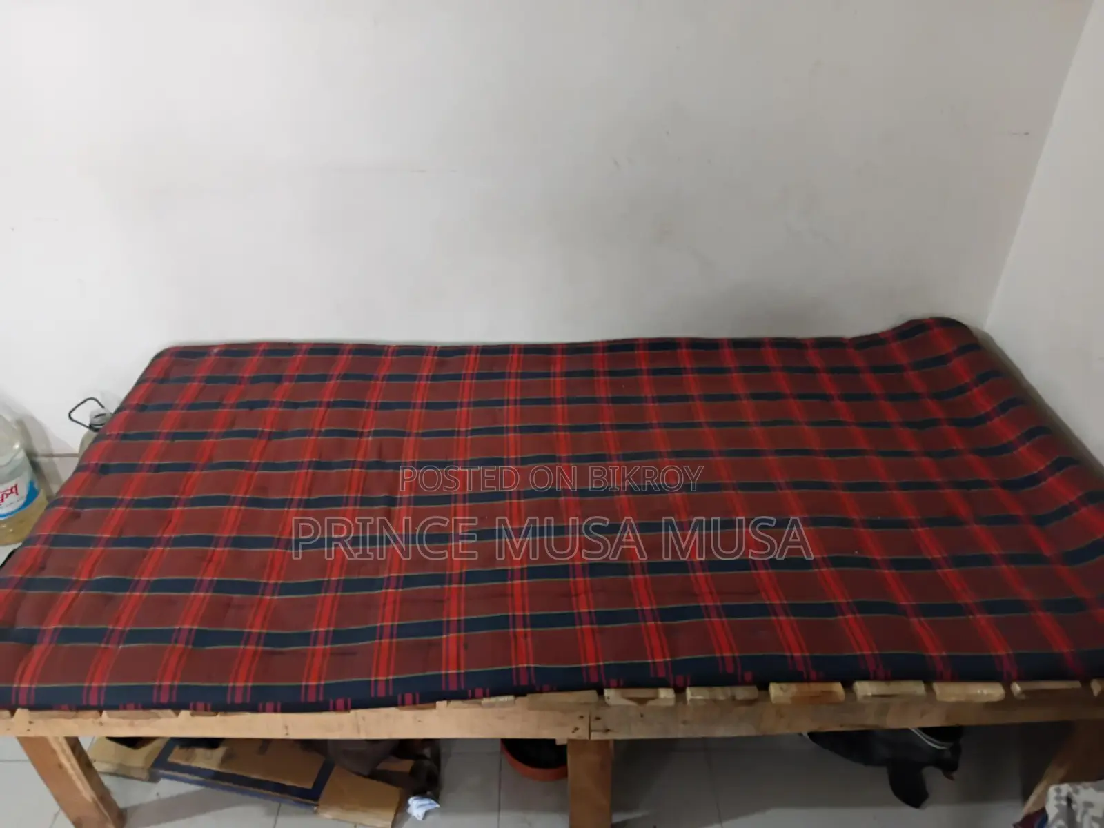 Wooden bed frame for sale.