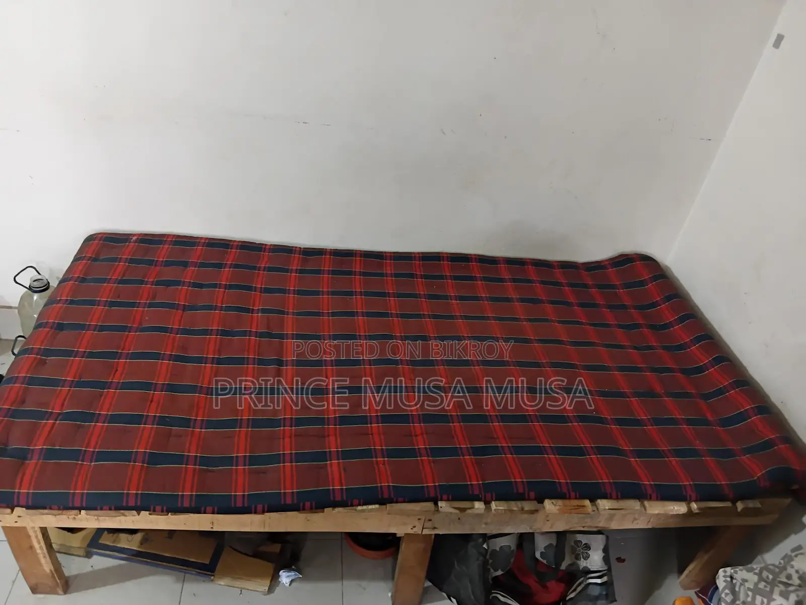 Wooden bed frame for sale.
