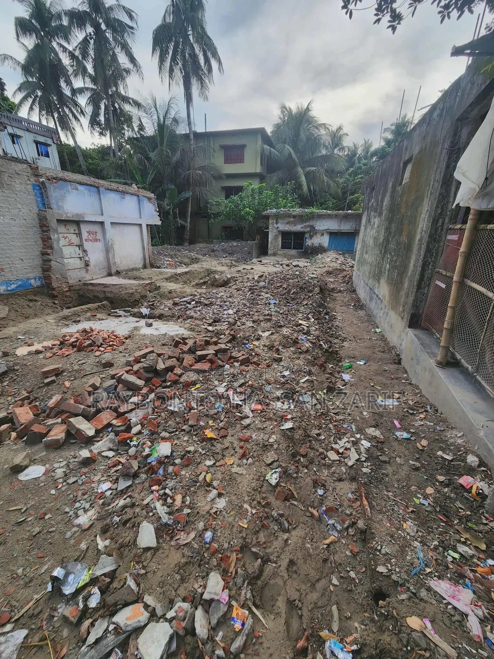Land ready for market with 2 shops