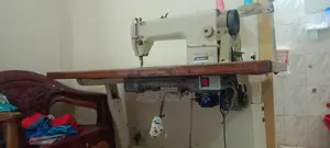 কারেন্টের সেলাই মেশিন