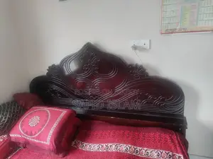 Bed and Almirah