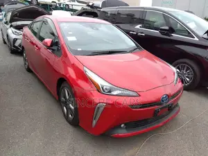 Toyota Prius S. touring. red 2020