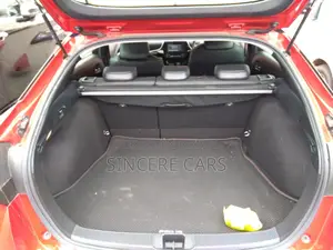 Toyota Prius S. touring. red 2020