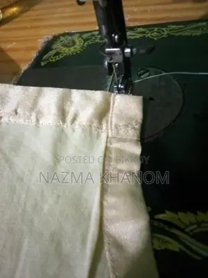 কম মুল্যে জামা কাপড় সেলাই