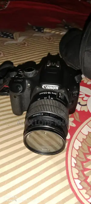 Canon 550D with 18-55mm Kit Lens and Zoom Lens