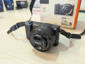 Sony A5100 Mirrorless Camera With Lens, Original Charger Box.
