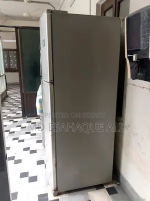 Selling SHARP Fridge. Even though it is old, it runs like brand new.