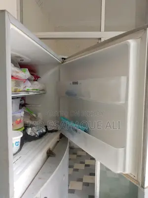 Selling SHARP Fridge. Even though it is old, it runs like brand new.