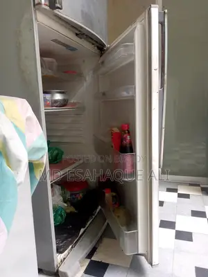 Selling SHARP Fridge. Even though it is old, it runs like brand new.