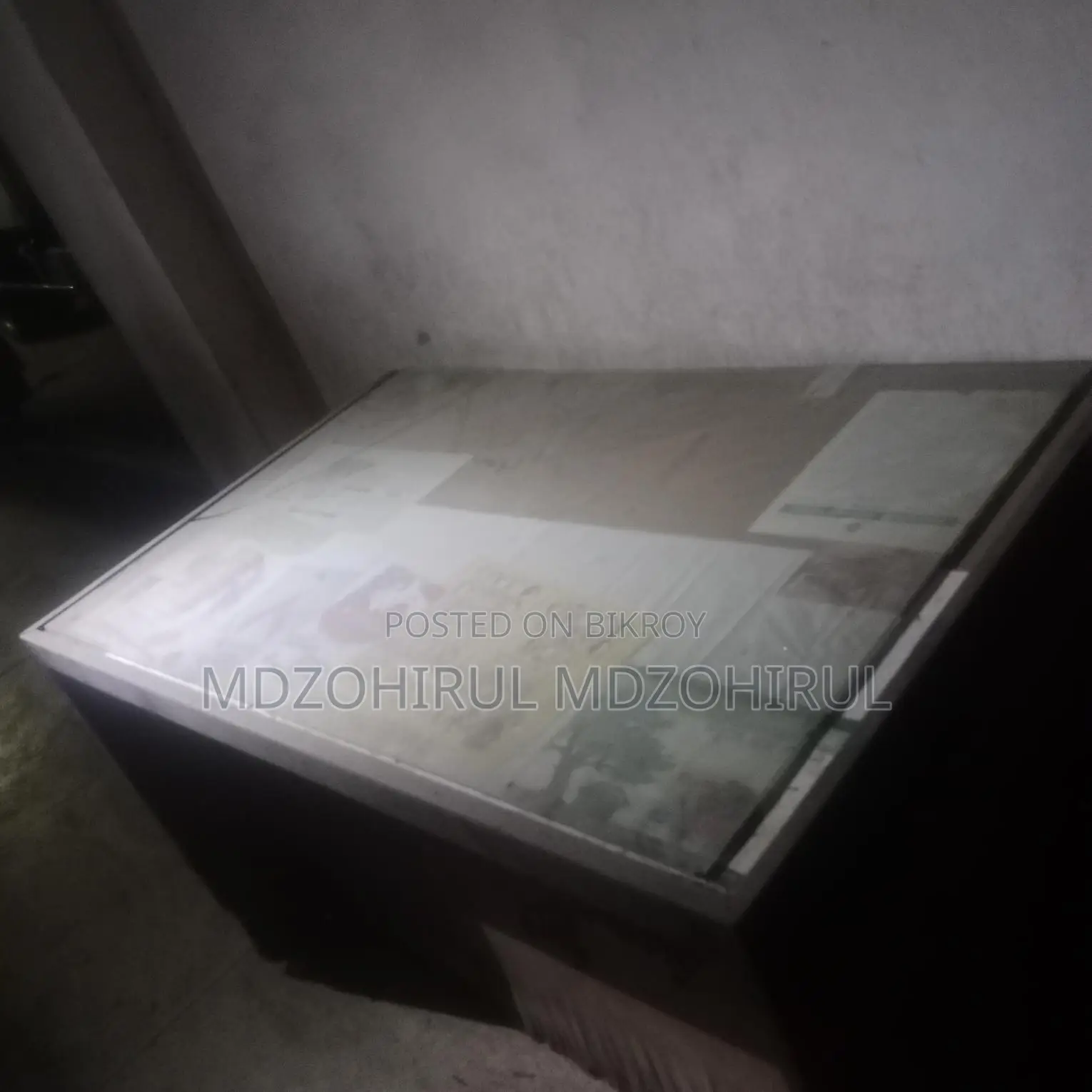 Two hardboard tables, one hardboard wardrobe, and a steel one