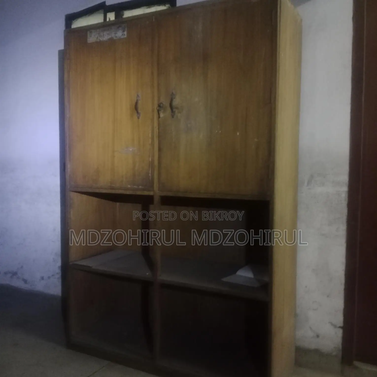Two hardboard tables, one hardboard wardrobe, and a steel one