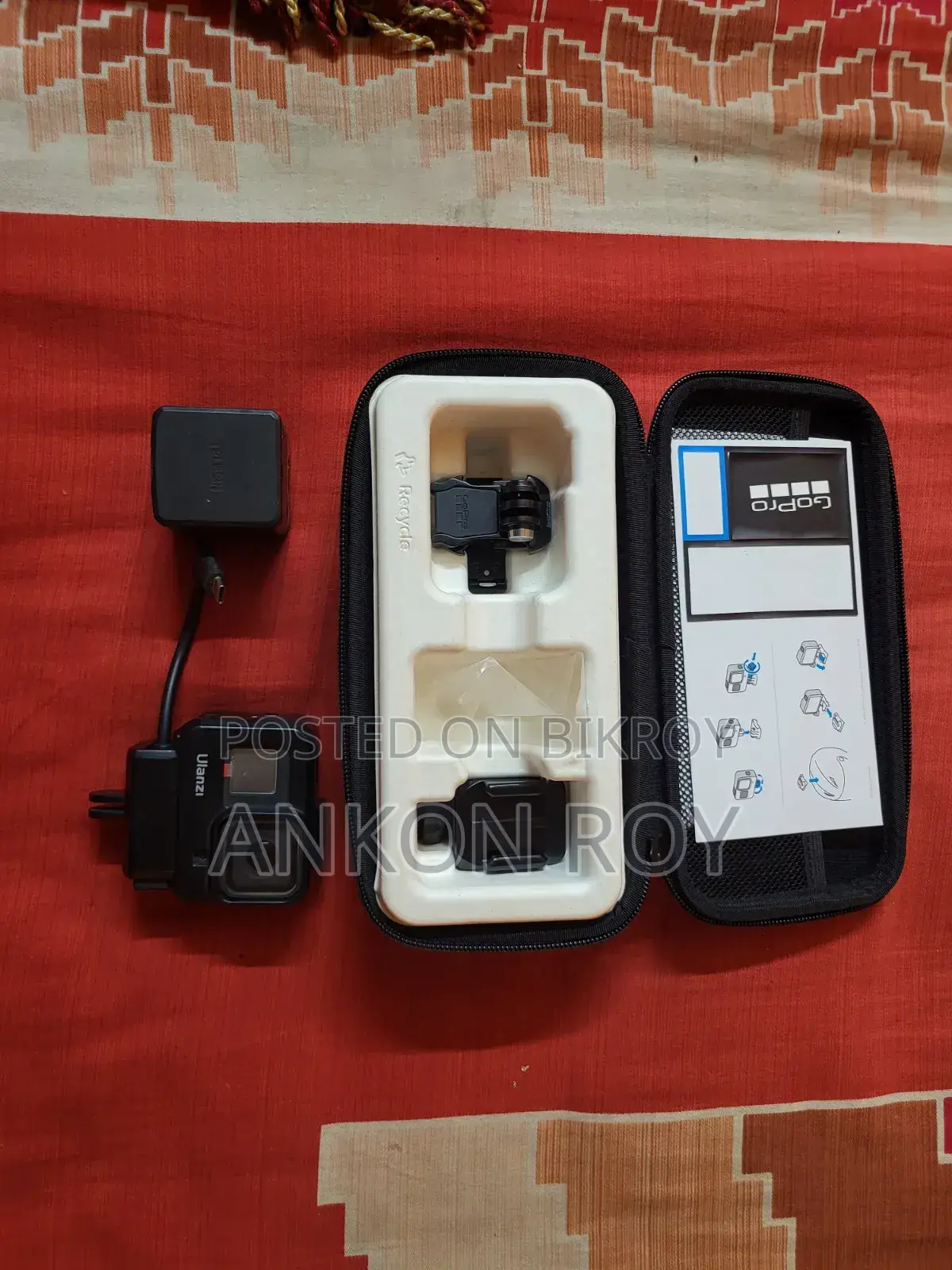 Includes 2 Batteries, Charger, Casing, and Microphone Adapter