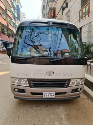 Nissan Coster Bus For Rent (28 Seats)