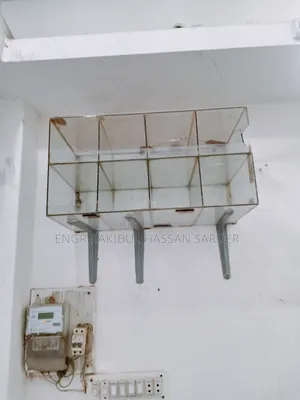 Two glass racks for sale, price 5000/=. One is 1ft × 40 inches, the other is 2×1.