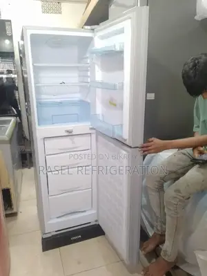 252 Liter running Vision refrigerator for sale.