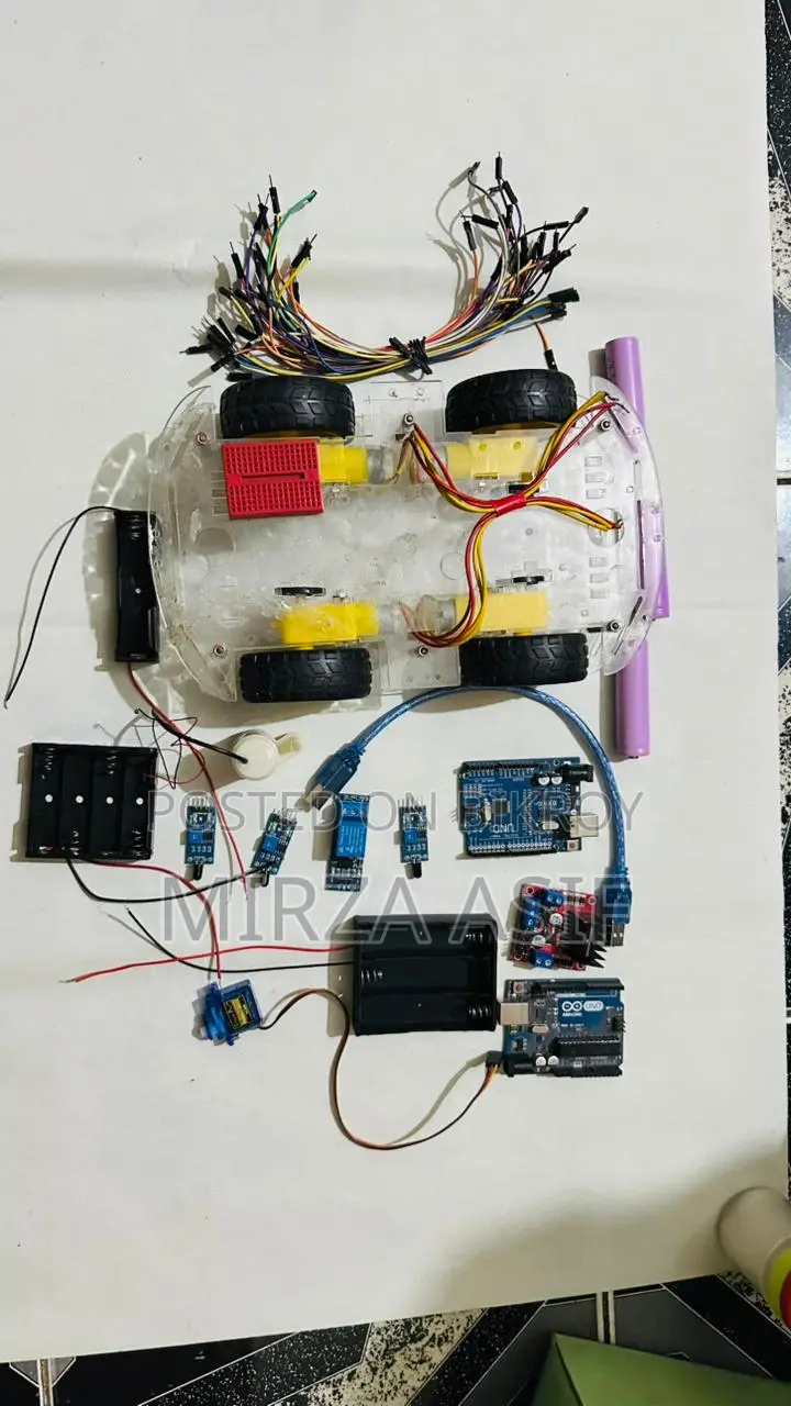 Arduino Uno, Motor Driver, Car Chassis Etc.