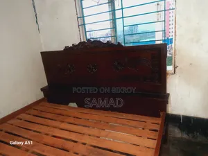 Board and Wooden Bed