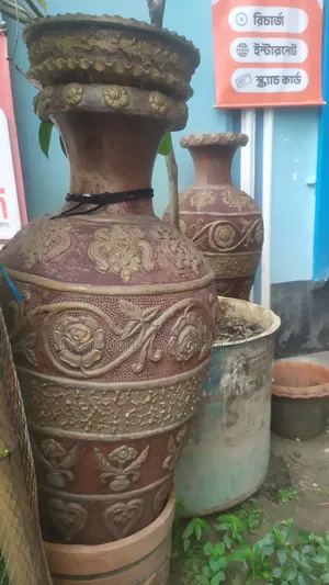 ডিজাইন ফুলের কলোসি টপ এখানে পাঁচটি ফুলের টপ আছে