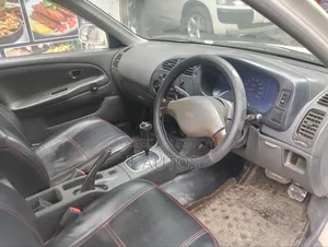 Mitsubishi Lancer 1999 White