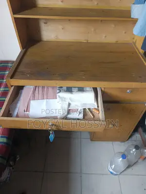 A Beautiful Study Table with Shelves for Clothes and Essentials
