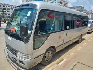 Nissan Coster Bus For Rent